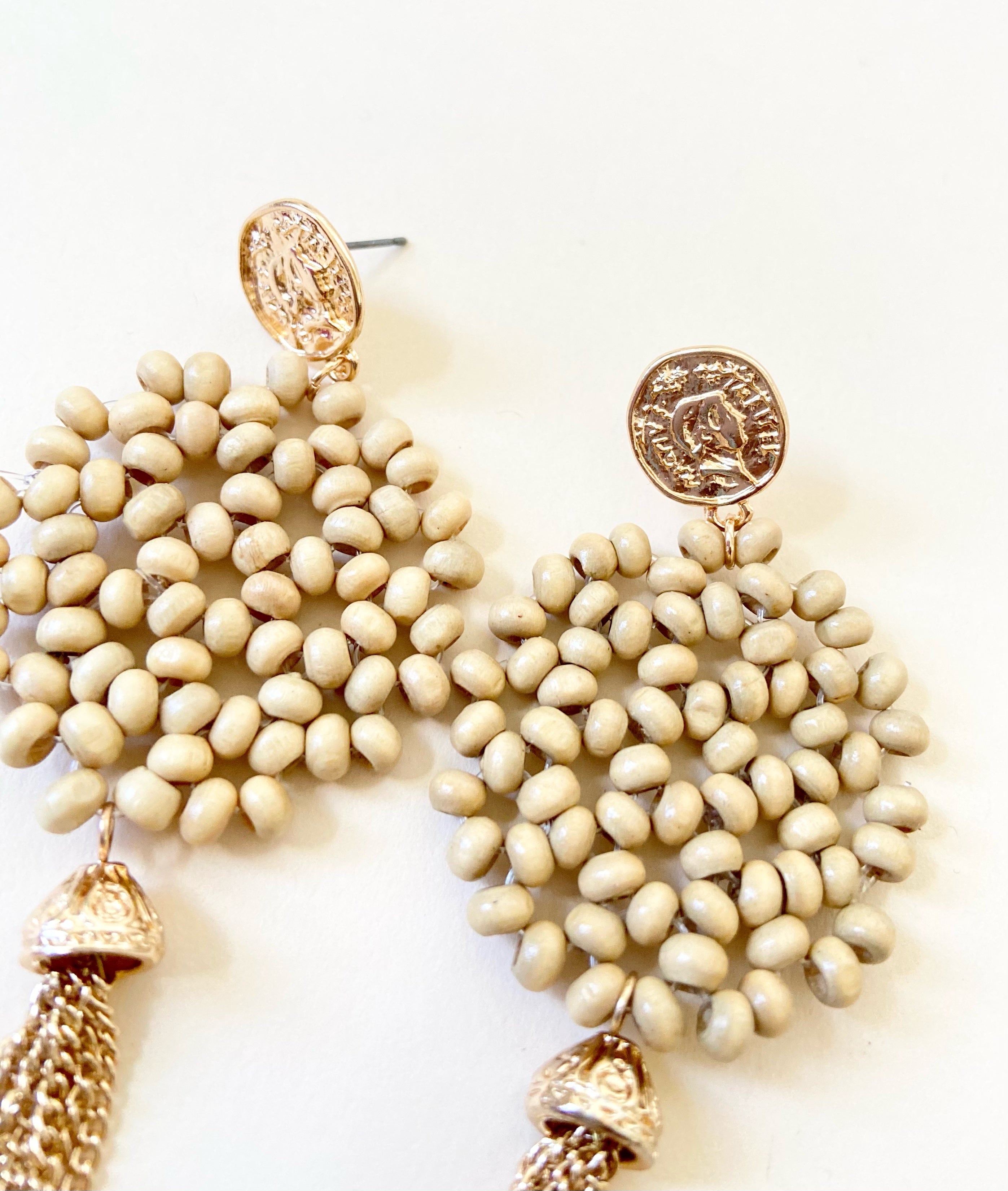 Joyalukkas - This pair of gold flower earrings is... | Facebook